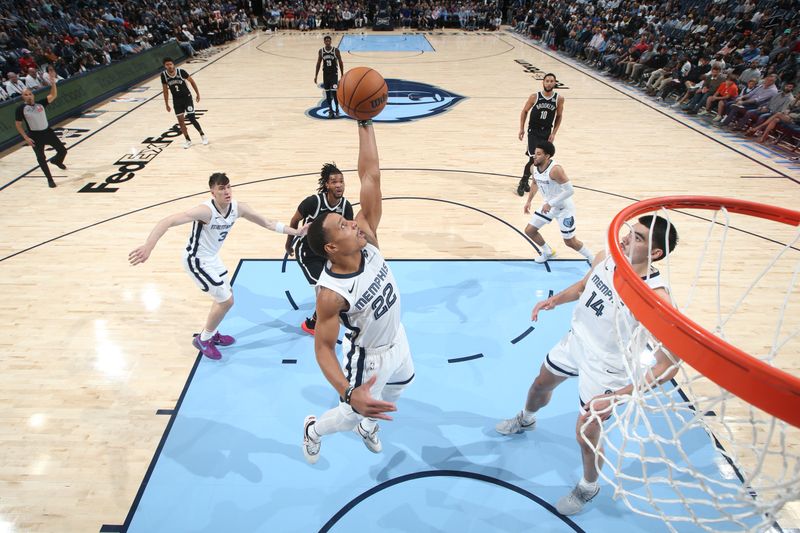 MEMPHIS, TN - OCTOBER 30: Desmond Bane #22 of the Memphis Grizzlies rebounds the ball during the game against the Brooklyn Nets on October 30, 2024 at FedExForum in Memphis, Tennessee. NOTE TO USER: User expressly acknowledges and agrees that, by downloading and or using this photograph, User is consenting to the terms and conditions of the Getty Images License Agreement. Mandatory Copyright Notice: Copyright 2024 NBAE (Photo by Joe Murphy/NBAE via Getty Images)