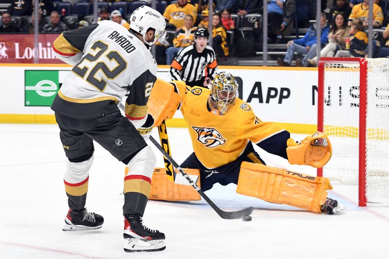 Mar 26, 2024; Nashville, Tennessee, USA; Vegas Golden Knights right wing Michael Amadio (22) has his shot blocked by Nashville Predators goaltender Juuse Saros (74) during the second period at Bridgestone Arena. Mandatory Credit: Christopher Hanewinckel-USA TODAY Sports