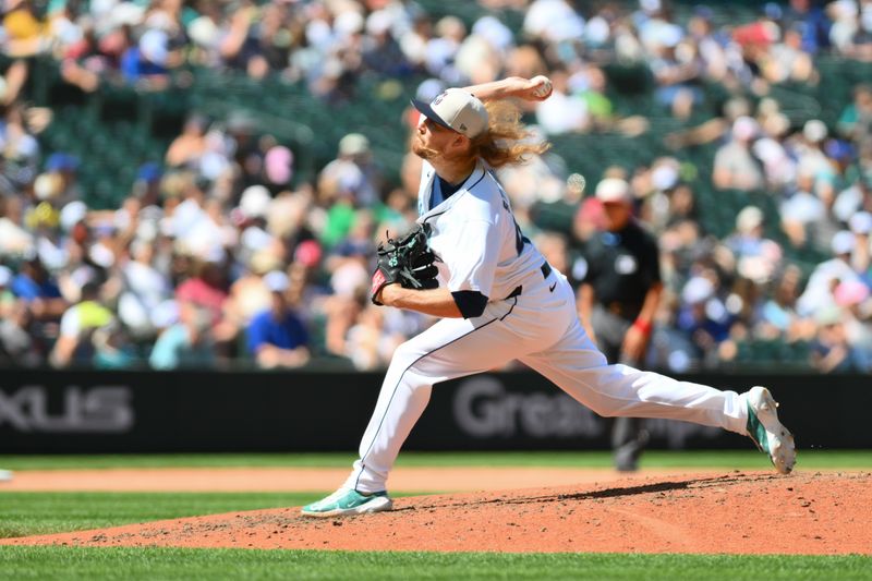 Jul 4, 2024; Seattle, Washington, USA; Seattle Mariners relief pitcher Ryne Stanek (45) pitches to the Baltimore Orioles during the seventh inning at T-Mobile Park. Mandatory Credit: Steven Bisig-USA TODAY Sports