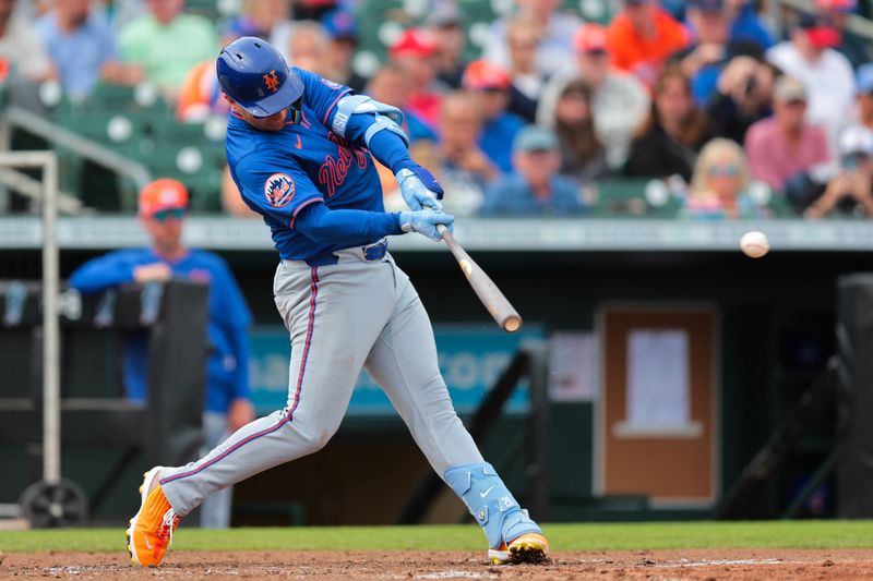 Feb 24, 2025; Jupiter, Florida, USA; New York Mets first base Pete Alonso (20) hits a two-run double across the during the third inning at Roger Dean Chevrolet Stadium. Mandatory Credit: Sam Navarro-Imagn Images