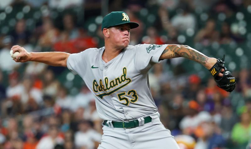 May 15, 2024; Houston, Texas, USA; Oakland Athletics starting pitcher Aaron Brooks (53) pitches against the Houston Astros in the first inning at Minute Maid Park. Mandatory Credit: Thomas Shea-USA TODAY Sports