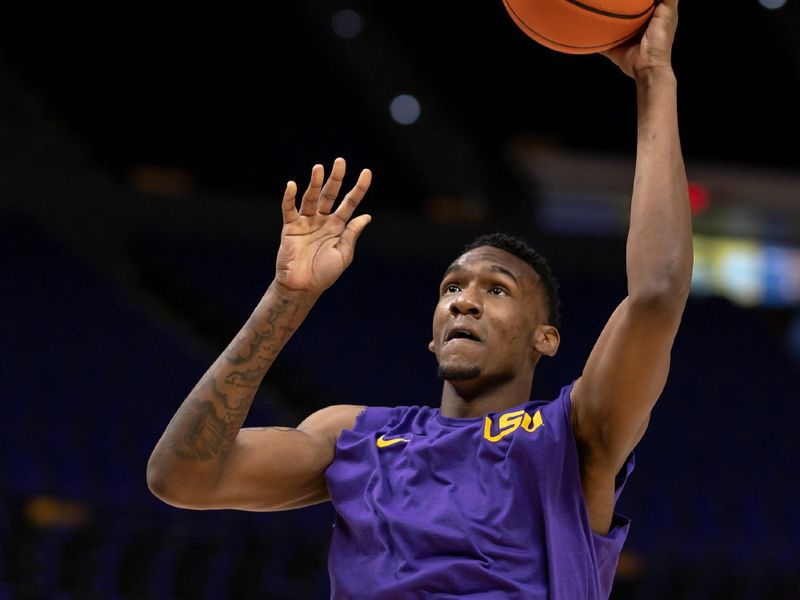 Jan 21, 2023; Baton Rouge, Louisiana, USA; LSU Tigers forward Shawn Phillips (34) warms up before a game against the Tennessee Volunteers at Pete Maravich Assembly Center. Mandatory Credit: Stephen Lew-USA TODAY Sports