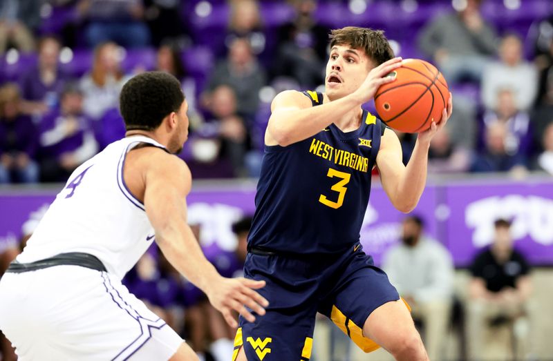 Feb 12, 2024; Fort Worth, Texas, USA; West Virginia Mountaineers guard Kerr Kriisa (3) looks to pass as TCU Horned Frogs guard Jameer Nelson Jr. (4) defends  during the second half at Ed and Rae Schollmaier Arena. Mandatory Credit: Kevin Jairaj-USA TODAY Sports