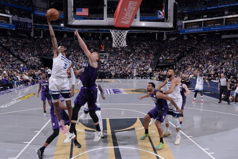 SACRAMENTO, CA - NOVEMBER 15: Jaden McDaniels #3 of the Minnesota Timberwolves drives to the basket during the game against the Sacramento Kings during the Emirates NBA Cup game on November 15, 2024 at Golden 1 Center in Sacramento, California. NOTE TO USER: User expressly acknowledges and agrees that, by downloading and or using this Photograph, user is consenting to the terms and conditions of the Getty Images License Agreement. Mandatory Copyright Notice: Copyright 2024 NBAE (Photo by Rocky Widner/NBAE via Getty Images)