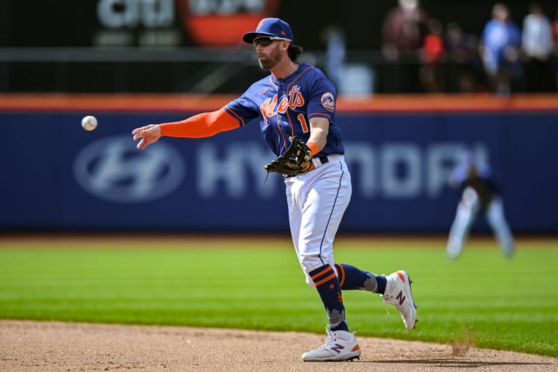 Jun 4, 2023; New York City, New York, USA; New York Mets second baseman Jeff McNeil (1) throws to first base for an out during the seventh inning against the Toronto Blue Jays at Citi Field. Mandatory Credit: John Jones-USA TODAY Sports