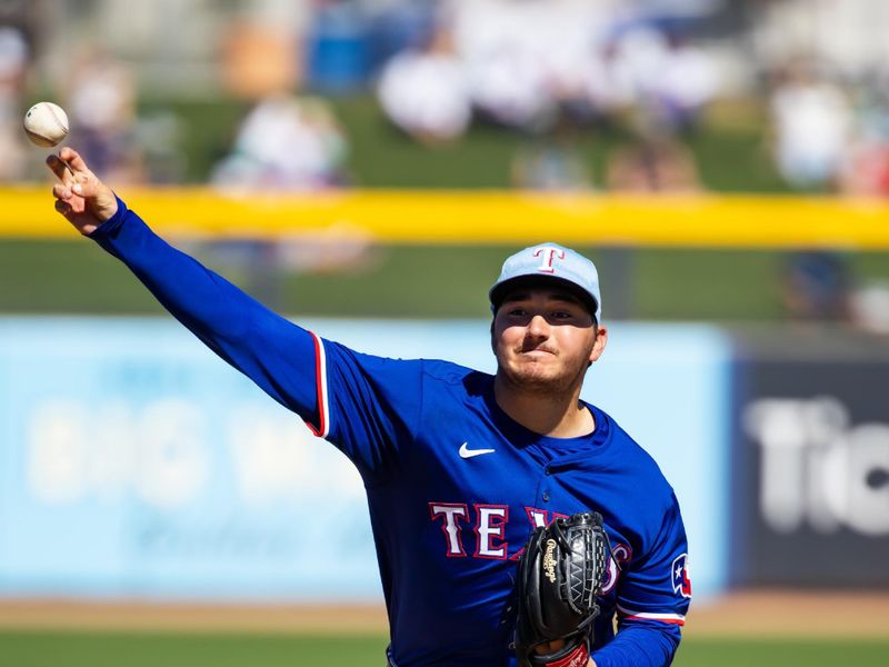 Mar 5, 2024; Peoria, Arizona, USA; Texas Rangers pitcher Owen White against the Seattle Mariners during a spring training baseball game at Peoria Sports Complex. Mandatory Credit: Mark J. Rebilas-USA TODAY Sports