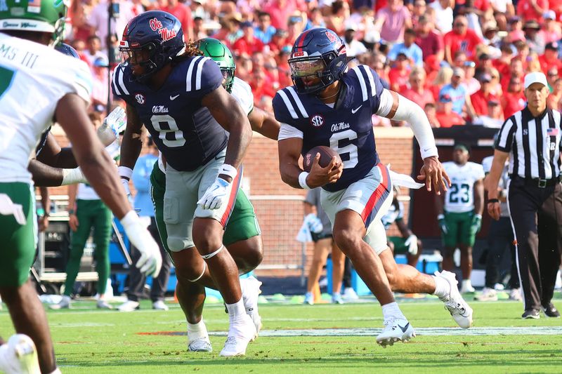 Sep 20, 2025; Oxford, Mississippi, USA; Mississippi Rebels quarterback Trinidad Chambliss (6) runs the ball during the third quarter against the Tulane Green Wave at Vaught-Hemingway Stadium. Mandatory Credit: Petre Thomas-Imagn Images