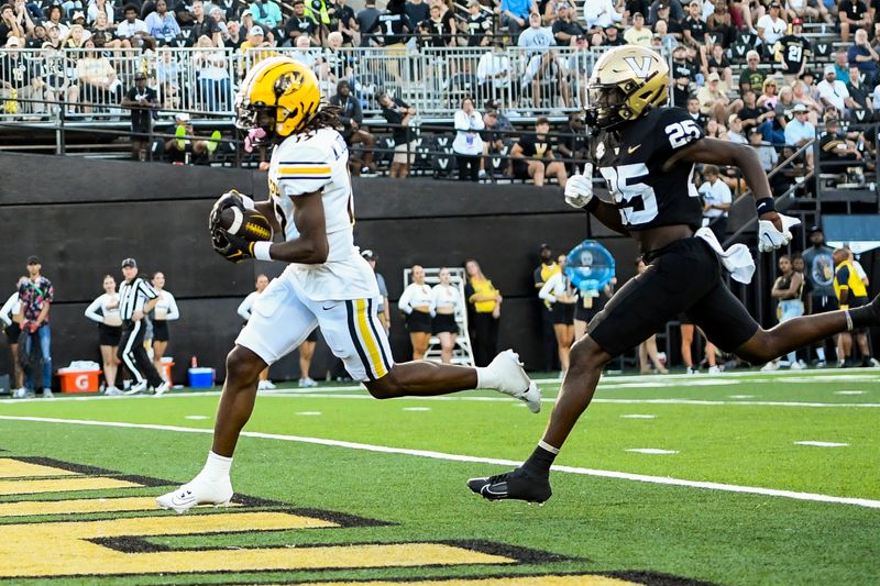 Sep 30, 2023; Nashville, Tennessee, USA;  Missouri Tigers wide receiver Marquis Johnson (17) scores late against the Vanderbilt Commodores during the second half at FirstBank Stadium. Mandatory Credit: Steve Roberts-USA TODAY Sports