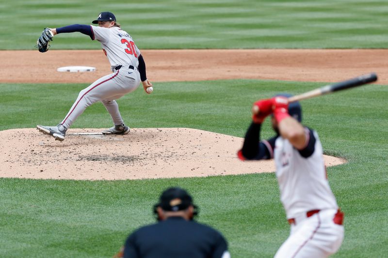 Jun 9, 2024; Washington, District of Columbia, USA; Atlanta Braves starting pitcher Hurston Waldrep (30) pitches against Washington Nationals first baseman Joey Gallo (24) during the third inning at Nationals Park. Mandatory Credit: Geoff Burke-USA TODAY Sports