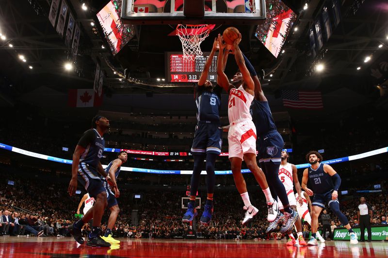 TORONTO, CANADA - JANUARY 22: Thaddeus Young #21 of the Toronto Raptors drives to the basket during the game against the Memphis Grizzlies on January 22, 2024 at the Scotiabank Arena in Toronto, Ontario, Canada.  NOTE TO USER: User expressly acknowledges and agrees that, by downloading and or using this Photograph, user is consenting to the terms and conditions of the Getty Images License Agreement.  Mandatory Copyright Notice: Copyright 2024 NBAE (Photo by Vaughn Ridley/NBAE via Getty Images)