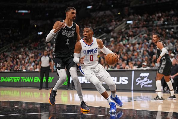 SAN ANTONIO, TX - NOVEMBER 22: Russell Westbrook #0 of the LA Clippers dribbles the ball during the game against the San Antonio Spurs on November 22, 2023 at the Frost Bank Center in San Antonio, Texas. NOTE TO USER: User expressly acknowledges and agrees that, by downloading and or using this photograph, user is consenting to the terms and conditions of the Getty Images License Agreement. Mandatory Copyright Notice: Copyright 2023 NBAE (Photos by Darren Carroll/NBAE via Getty Images)