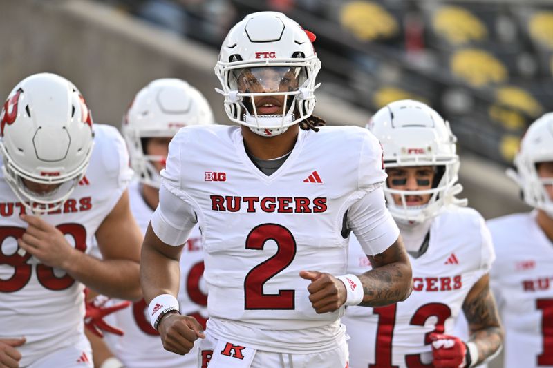 Nov 11, 2023; Iowa City, Iowa, USA; Rutgers Scarlet Knights quarterback Gavin Wimsatt (2) and teammates enter Kinnick Stadium before the game against the Iowa Hawkeyes. Mandatory Credit: Jeffrey Becker-USA TODAY Sports