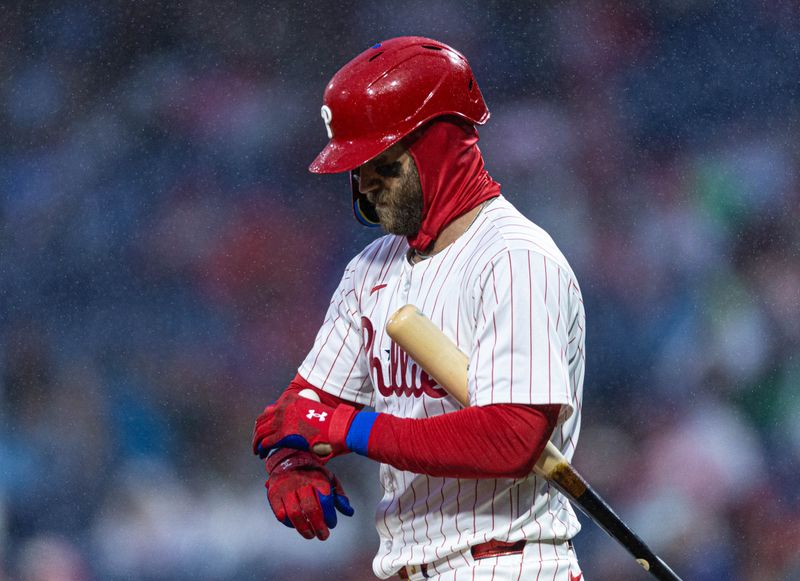 Apr 2, 2024; Philadelphia, Pennsylvania, USA; Philadelphia Phillies first baseman Bryce Harper (3) prepares to bat during the first inning against the Cincinnati Reds at Citizens Bank Park. Mandatory Credit: Bill Streicher-USA TODAY Sports