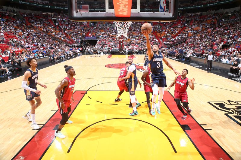 MIAMI, FL - JANUARY 22: CJ McCollum #3 of the New Orleans Pelicans drives to the basket during the game against the Miami Heat on January 22, 2023 at Miami-Dade Arena in Miami, Florida. NOTE TO USER: User expressly acknowledges and agrees that, by downloading and or using this Photograph, user is consenting to the terms and conditions of the Getty Images License Agreement. Mandatory Copyright Notice: Copyright 2023 NBAE (Photo by Nathaniel S. Butler/NBAE via Getty Images)