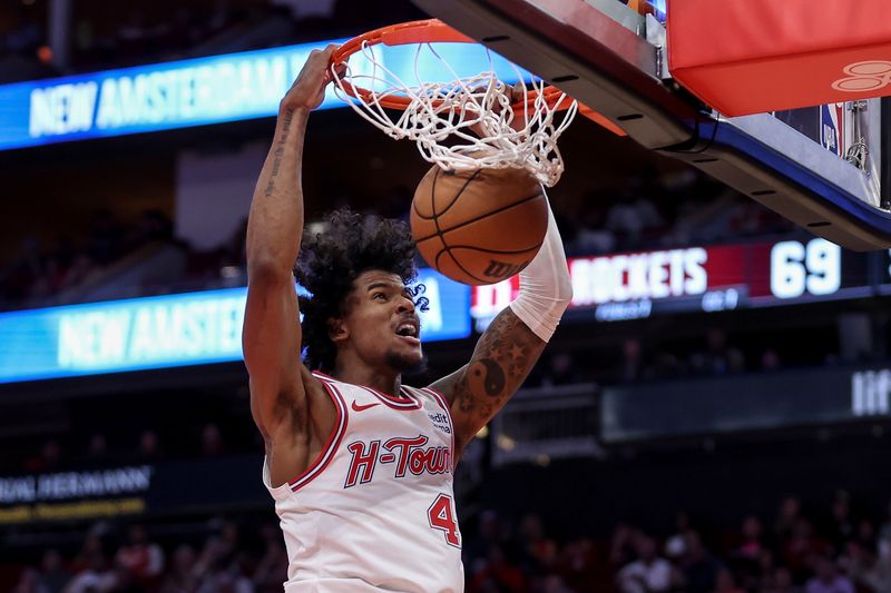 HOUSTON, TEXAS - APRIL 05: Jalen Green #4 of the Houston Rockets dunks the ball in the second half against the Miami Heat at Toyota Center on April 05, 2024 in Houston, Texas.  NOTE TO USER: User expressly acknowledges and agrees that, by downloading and or using this photograph, User is consenting to the terms and conditions of the Getty Images License Agreement. (Photo by Tim Warner/Getty Images)