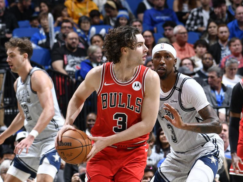 ORLANDO, FL - NOVEMBER 27: Josh Giddey #3 of the Chicago Bulls handles the ball during the game against the Orlando Magic on November 27, 2024 at Kia Center in Orlando, Florida. NOTE TO USER: User expressly acknowledges and agrees that, by downloading and or using this photograph, User is consenting to the terms and conditions of the Getty Images License Agreement. Mandatory Copyright Notice: Copyright 2024 NBAE (Photo by Fernando Medina/NBAE via Getty Images)