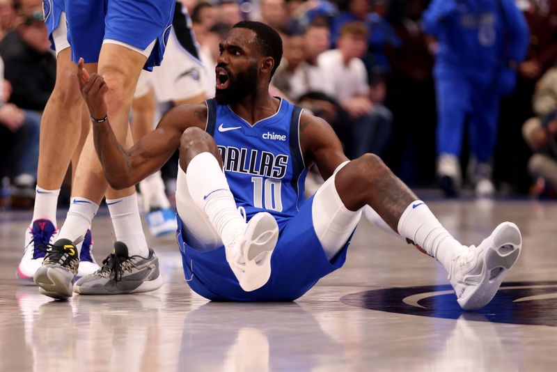 DALLAS, TEXAS - JANUARY 29: Tim Hardaway Jr. #10 of the Dallas Mavericks reacts after being fouled in the second half against the Orlando Magic at American Airlines Center on January 29, 2024 in Dallas, Texas. NOTE TO USER: User expressly acknowledges and agrees that, by downloading and or using this photograph, User is consenting to the terms and conditions of the Getty Images License Agreement. (Photo by Tim Heitman/Getty Images)