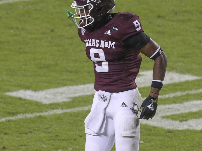 Nov 28, 2020; College Station, Texas, USA; Texas A&M Aggies defensive back Leon O'Neal Jr. (9) celebrates a LSU Tigers missed field goal in the second quarter at Kyle Field. Mandatory Credit: Thomas Shea-USA TODAY Sports