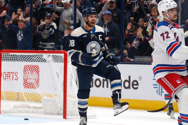 Oct 14, 2023; Columbus, Ohio, USA; Columbus Blue Jackets center Boone Jenner (38) celebrates his goal against the New York Rangers during the first period at Nationwide Arena. Mandatory Credit: Russell LaBounty-USA TODAY Sports