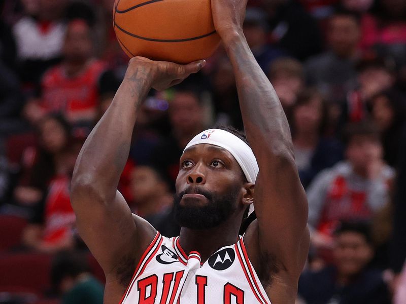 CHICAGO, ILLINOIS - FEBRUARY 26: Patrick Beverley #21 of the Chicago Bulls shoots a three pointer against the Washington Wizards during the second half at United Center on February 26, 2023 in Chicago, Illinois. NOTE TO USER: User expressly acknowledges and agrees that, by downloading and or using this photograph, User is consenting to the terms and conditions of the Getty Images License Agreement.  (Photo by Michael Reaves/Getty Images)