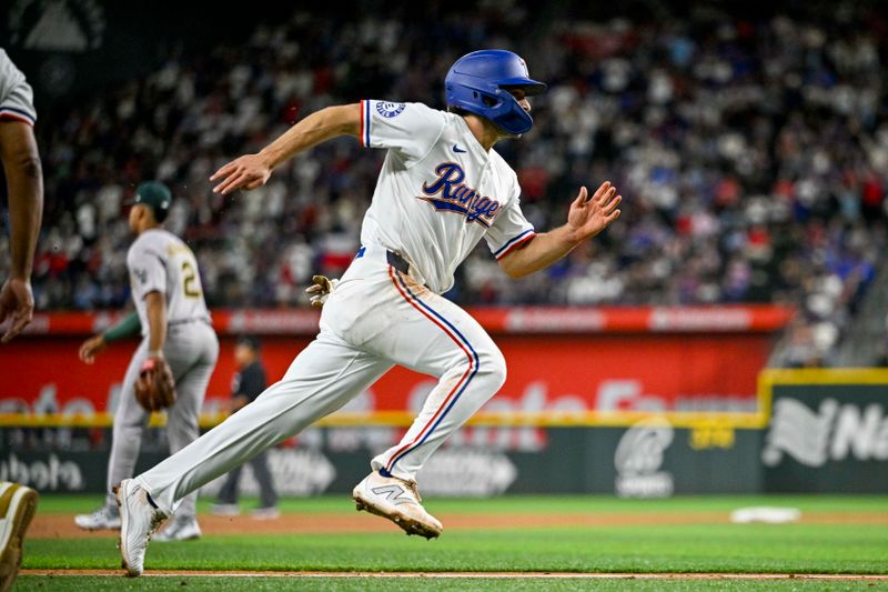 Apr 10, 2024; Arlington, Texas, USA; Texas Rangers third baseman Josh Smith (8) scores against the Oakland Athletics during the first inning at Globe Life Field. Mandatory Credit: Jerome Miron-USA TODAY Sports