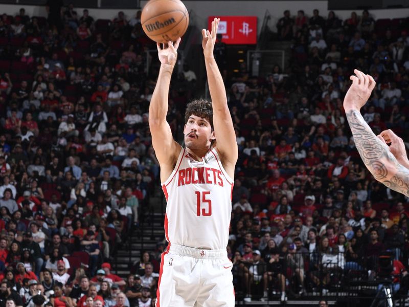 HOUSTON, TX - NOVEMBER 6: Reed Sheppard #15 of the Houston Rockets shoots a three point basket during the game against the San Antonio Spurs  on November 6, 2024 at the Toyota Center in Houston, Texas. NOTE TO USER: User expressly acknowledges and agrees that, by downloading and or using this photograph, User is consenting to the terms and conditions of the Getty Images License Agreement. Mandatory Copyright Notice: Copyright 2024 NBAE (Photo by Logan Riely/NBAE via Getty Images)