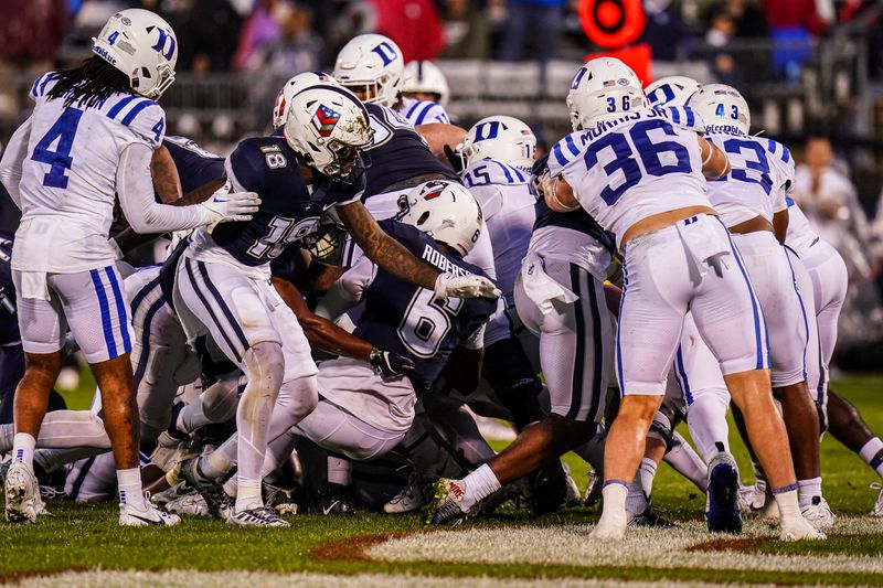 Sep 23, 2023; East Hartford, Connecticut, USA; UConn Huskies quarterback Ta'Quan Roberson (6) drives the ball for a touchdown against the Duke Blue Devils in the second half at Rentschler Field at Pratt & Whitney Stadium. Mandatory Credit: David Butler II-USA TODAY Sports