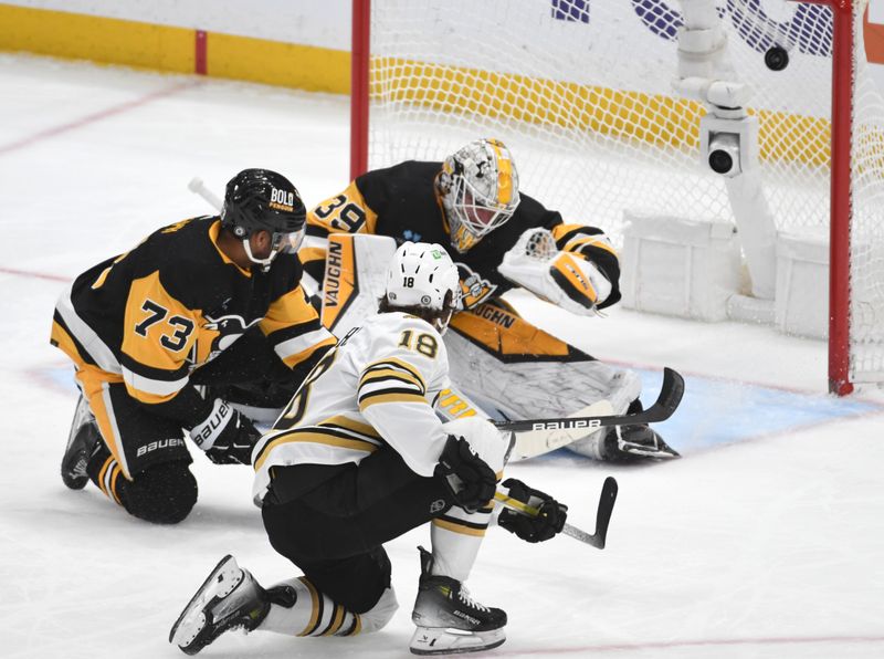 Apr 13, 2024; Pittsburgh, Pennsylvania, USA; Boston Bruins center center Pavel Zacha (18) scores on Pittsburgh Penguins goalie Alex Nedeljkovic (39) during the second period at PPG Paints Arena. Mandatory Credit: Philip G. Pavely-USA TODAY Sports