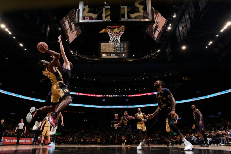 TORONTO, CANADA - APRIL 2: Immanuel Quickley #5 of the Toronto Raptors shoots the ball during the game against the Los Angeles Lakers on April 2, 2024 at the Scotiabank Arena in Toronto, Ontario, Canada.  NOTE TO USER: User expressly acknowledges and agrees that, by downloading and or using this Photograph, user is consenting to the terms and conditions of the Getty Images License Agreement.  Mandatory Copyright Notice: Copyright 2024 NBAE (Photo by Mark Blinch/NBAE via Getty Images)