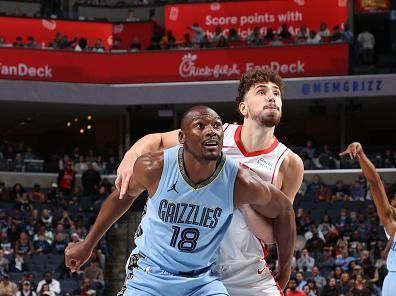 MEMPHIS, TN - DECEMBER 15:  Bismack Biyombo #18 of the Memphis Grizzlies boxes out during the game against the Houston Rockets on December 15, 2023 at FedExForum in Memphis, Tennessee. NOTE TO USER: User expressly acknowledges and agrees that, by downloading and or using this photograph, User is consenting to the terms and conditions of the Getty Images License Agreement. Mandatory Copyright Notice: Copyright 2023 NBAE (Photo by Joe Murphy/NBAE via Getty Images)