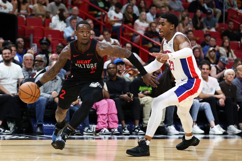 MIAMI, FLORIDA - MARCH 05: Terry Rozier #2 of the Miami Heat drives against Jaden Ivey #23 of the Detroit Pistons during the first quarter of the game at Kaseya Center on March 05, 2024 in Miami, Florida. NOTE TO USER: User expressly acknowledges and agrees that, by downloading and or using this photograph, User is consenting to the terms and conditions of the Getty Images License Agreement. (Photo by Megan Briggs/Getty Images)