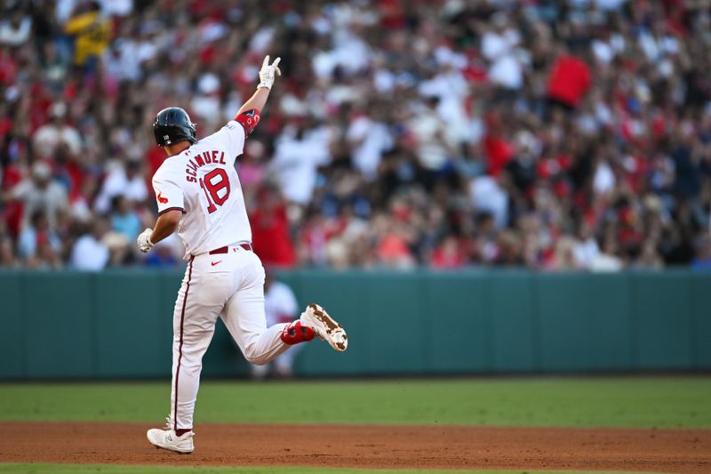 Jul 27, 2024; Anaheim, California, USA; Los Angeles Angels first baseman Nolan Schanuel (18) hits a home run against the Oakland Athletics during the third inning at Angel Stadium. Mandatory Credit: Jonathan Hui-USA TODAY Sports