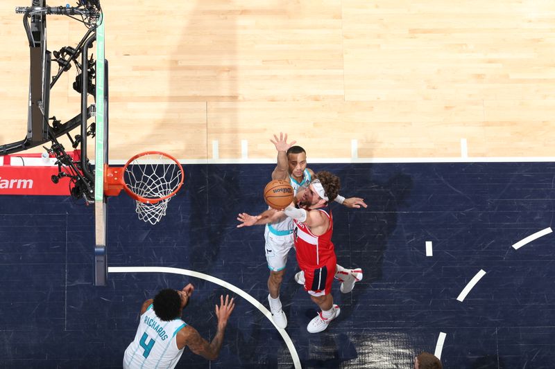 WASHINGTON, DC -? MARCH 8:  Corey Kispert #24 of the Washington Wizards goes to the basket during the game on March 8, 2024 at Capital One Arena in Washington, DC. NOTE TO USER: User expressly acknowledges and agrees that, by downloading and or using this Photograph, user is consenting to the terms and conditions of the Getty Images License Agreement. Mandatory Copyright Notice: Copyright 2024 NBAE (Photo by Stephen Gosling/NBAE via Getty Images)