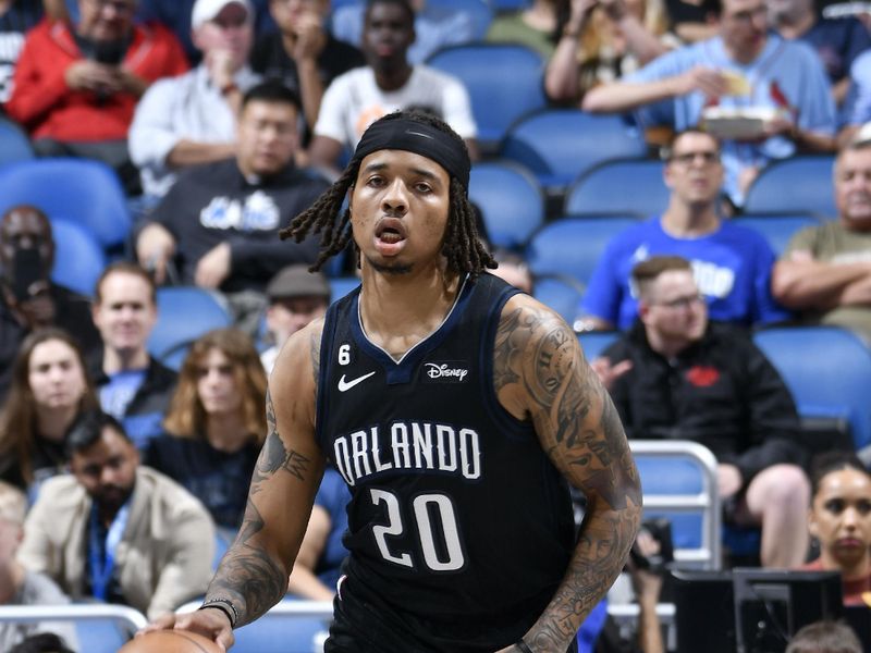 ORLANDO, FL - JANUARY 4: Markelle Fultz #20 of the Orlando Magic dribbles the ball against the Oklahoma City Thunder on January 4, 2023 at Amway Center in Orlando, Florida. NOTE TO USER: User expressly acknowledges and agrees that, by downloading and or using this photograph, User is consenting to the terms and conditions of the Getty Images License Agreement. Mandatory Copyright Notice: Copyright 2023 NBAE (Photo by Fernando Medina/NBAE via Getty Images)