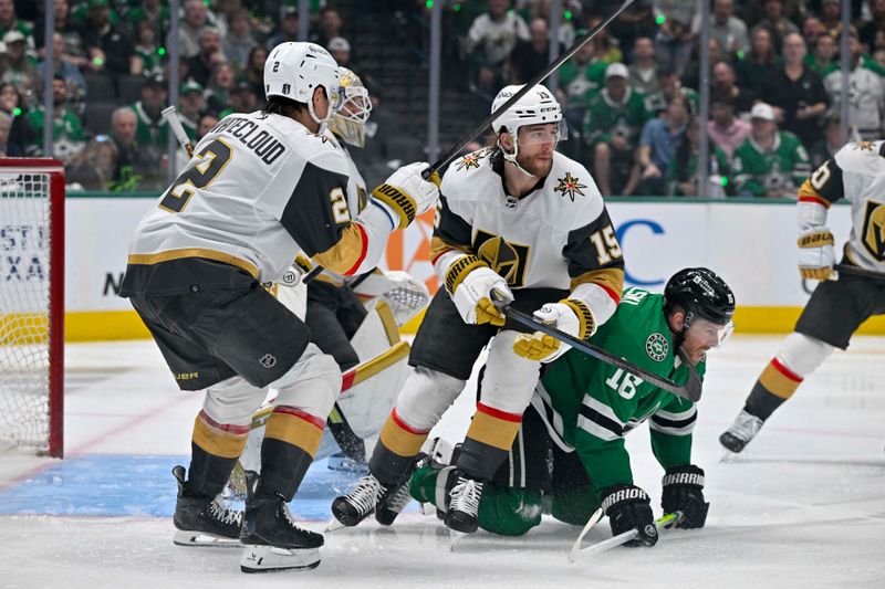 May 5, 2024; Dallas, Texas, USA; Vegas Golden Knights defenseman Noah Hanifin (15) takes down Dallas Stars center Joe Pavelski (16) in the Vegas zone during the second period in game seven of the first round of the 2024 Stanley Cup Playoffs at American Airlines Center. Mandatory Credit: Jerome Miron-USA TODAY Sports