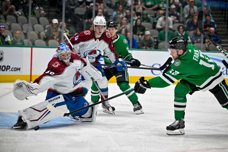 Oct 3, 2022; Dallas, Texas, USA; Colorado Avalanche goaltender Pavel Francouz (39) makes a pad save on a shot by Dallas Stars center Radek Faksa (12) during the second period at the American Airlines Center. Mandatory Credit: Jerome Miron-USA TODAY Sports