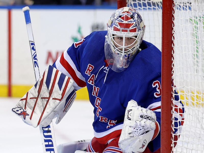 Dec 12, 2023; New York, New York, USA; New York Rangers goaltender Igor Shesterkin (31) tends net against the Toronto Maple Leafs during the first period at Madison Square Garden. Mandatory Credit: Brad Penner-USA TODAY Sports