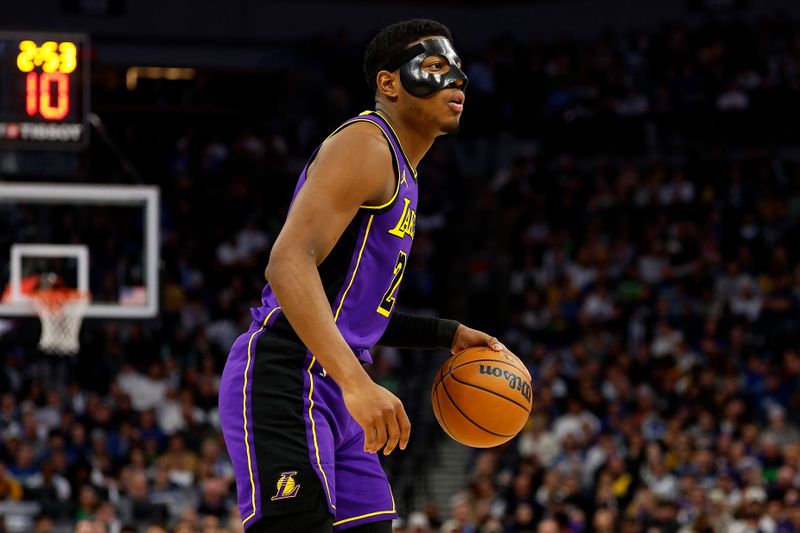 MINNEAPOLIS, MINNESOTA - DECEMBER 30: Rui Hachimura #28 of the Los Angeles Lakers dribbles the ball against the Minnesota Timberwolves in the third quarter at Target Center on December 30, 2023 in Minneapolis, Minnesota. The Timberwolves defeated the Lakers 108-106. NOTE TO USER: User expressly acknowledges and agrees that, by downloading and or using this photograph, User is consenting to the terms and conditions of the Getty Images License Agreement. (Photo by David Berding/Getty Images)