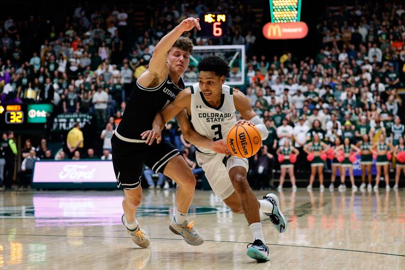 Feb 17, 2024; Fort Collins, Colorado, USA; Colorado State Rams guard Josiah Strong (3) controls the ball as Utah State Aggies guard Mason Falslev (12) guards in the second half at Moby Arena. Mandatory Credit: Isaiah J. Downing-USA TODAY Sports