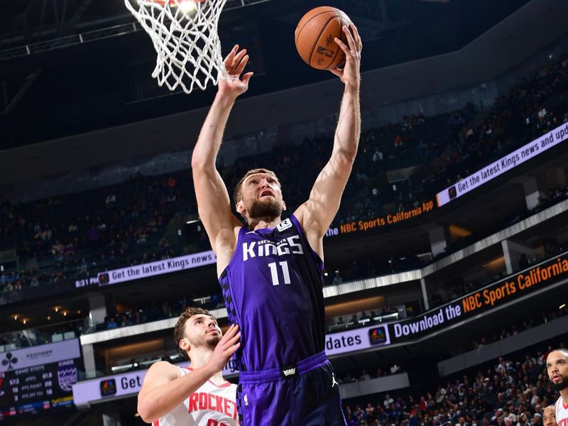 SACRAMENTO, CA - DECEMBER 3: Domantas Sabonis #11 of the Sacramento Kings drives to the basket during the game against the Houston Rockets during the Emirates NBA Cup game on December 3, 2024 at Golden 1 Center in Sacramento, California. NOTE TO USER: User expressly acknowledges and agrees that, by downloading and or using this Photograph, user is consenting to the terms and conditions of the Getty Images License Agreement. Mandatory Copyright Notice: Copyright 2024 NBAE (Photo by Adam Pantozzi/NBAE via Getty Images)