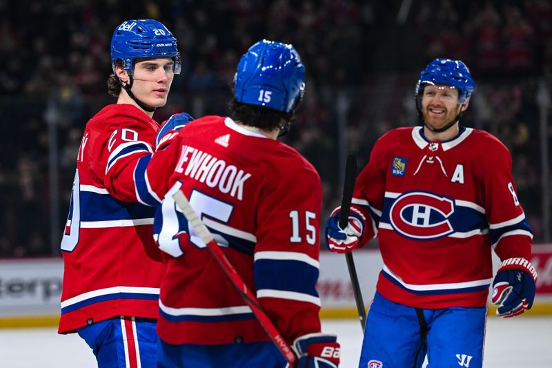 Mar 12, 2024; Montreal, Quebec, CAN; Montreal Canadiens left wing Juraj Slafkovsky (20) celebrates his goal against the Columbus Blue Jackets with his teammates during the first period at Bell Centre. Mandatory Credit: David Kirouac-USA TODAY Sports