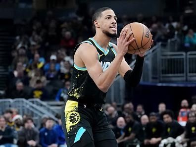 INDIANAPOLIS, INDIANA - DECEMBER 20: Tyrese Haliburton #0 of the Indiana Pacers attempts a shot in the first quarter against the Charlotte Hornets at Gainbridge Fieldhouse on December 20, 2023 in Indianapolis, Indiana. NOTE TO USER: User expressly acknowledges and agrees that, by downloading and or using this photograph, User is consenting to the terms and conditions of the Getty Images License Agreement. (Photo by Dylan Buell/Getty Images)