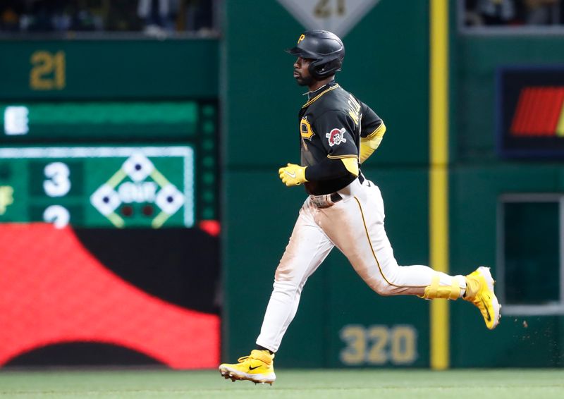 Apr 8, 2023; Pittsburgh, Pennsylvania, USA;  Pittsburgh Pirates right fielder Andrew McCutchen (22) circles the bases on a solo home run against the Chicago White Sox during the ninth inning at PNC Park. Chicago won 11-5, Mandatory Credit: Charles LeClaire-USA TODAY Sports