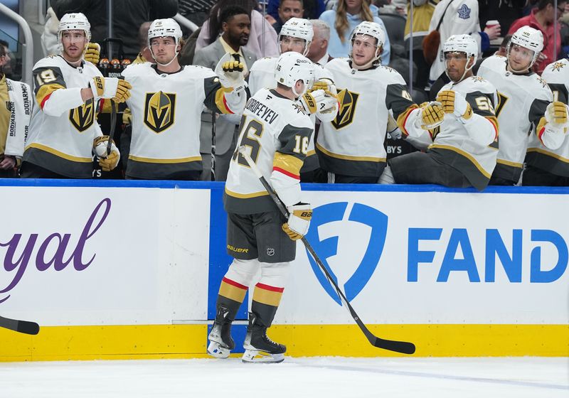 Jan 23, 2026; Toronto, Ontario, CAN; Vegas Golden Knights right wing Pavel Dorofeyev (16)  celebrates at the bench after scoring a goal against the Toronto Maple Leafs during the second period at Scotiabank Arena. Mandatory Credit: Nick Turchiaro-Imagn Images