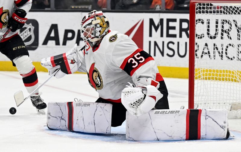 Dec 1, 2024; Anaheim, California, USA;  Ottawa Senators goaltender Linus Ullmark (35) deflects a shot against the Anaheim Ducks during the second period at Honda Center. Mandatory Credit: Alex Gallardo-Imagn Images