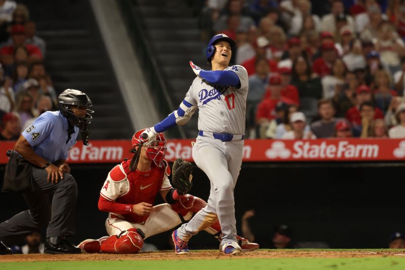 Aug 13, 2025; Anaheim, California, USA;  Los Angeles Dodgers two-way player Shohei Ohtani (17) strikes out during the eighth inning against the Los Angeles Angels at Angel Stadium. Mandatory Credit: Kiyoshi Mio-Imagn Images