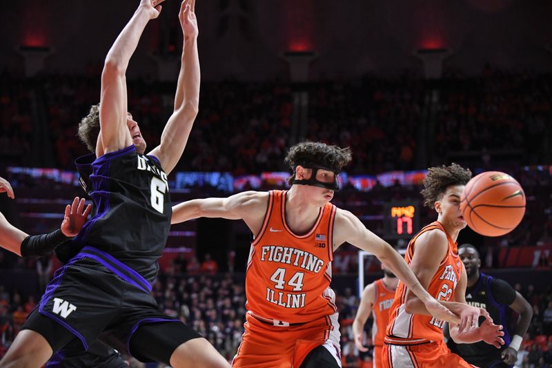 Jan 29, 2026; Champaign, Illinois, USA;  Illinois Fighting Illini forward Zvonimir Ivisic (44) and teammate  Keaton Wagler (23) chase down the ball during the first half at State Farm Center. Mandatory Credit: Ron Johnson-Imagn Images