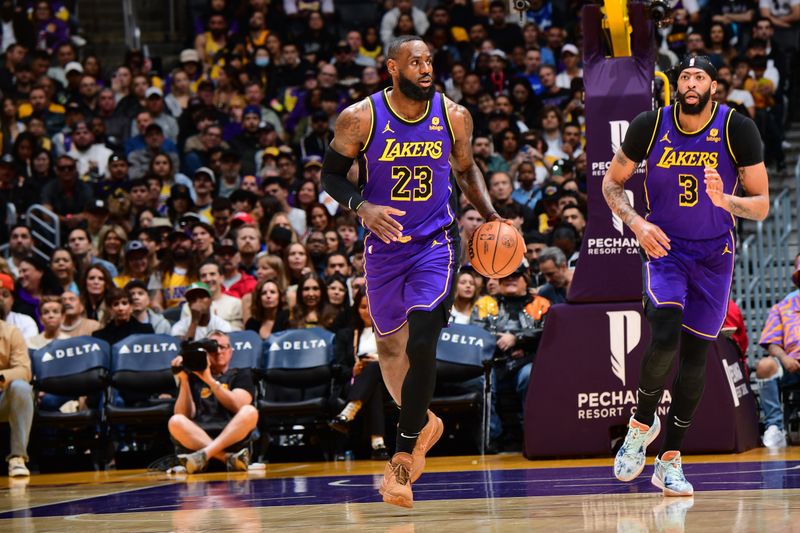 LOS ANGELES, CA - MARCH 22: LeBron James #23 of the Los Angeles Lakers dribbles the ball during the game against the Philadelphia 76ers on March 22, 2024 at Crypto.Com Arena in Los Angeles, California. NOTE TO USER: User expressly acknowledges and agrees that, by downloading and/or using this Photograph, user is consenting to the terms and conditions of the Getty Images License Agreement. Mandatory Copyright Notice: Copyright 2024 NBAE (Photo by Adam Pantozzi/NBAE via Getty Images)