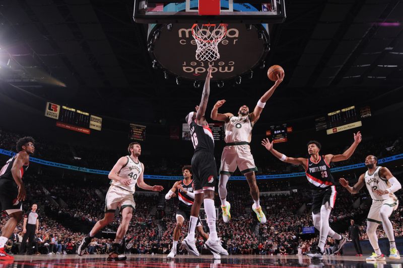 PORTLAND, OR - MARCH 11:Jayson Tatum #0 of the Boston Celtics drives to the basket during the game against the Portland Trail Blazers  on March 11, 2024 at the Moda Center Arena in Portland, Oregon. NOTE TO USER: User expressly acknowledges and agrees that, by downloading and or using this photograph, user is consenting to the terms and conditions of the Getty Images License Agreement. Mandatory Copyright Notice: Copyright 2024 NBAE (Photo by Cameron Browne/NBAE via Getty Images)