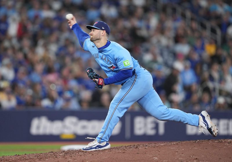 May 11, 2024; Toronto, Ontario, CAN; Toronto Blue Jays relief pitcher Zach Pop (56) throws a pitch against the Minnesota Twins during the fourth inning at Rogers Centre. Mandatory Credit: Nick Turchiaro-USA TODAY Sports